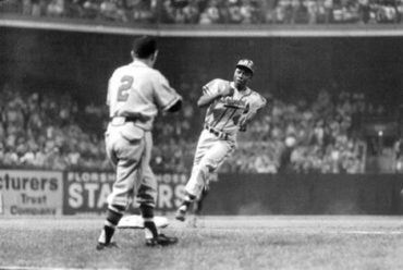Ebbets Field, Brooklyn, NY, August 1, 1956 – Hank Aaron Hustles to Third Base in 2-1 Loss