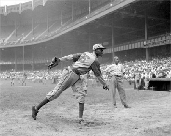 Yankee Stadium, Bronx, NY, August 2, 1942 – Satchel Paige Warms Up Before Monarchs Game