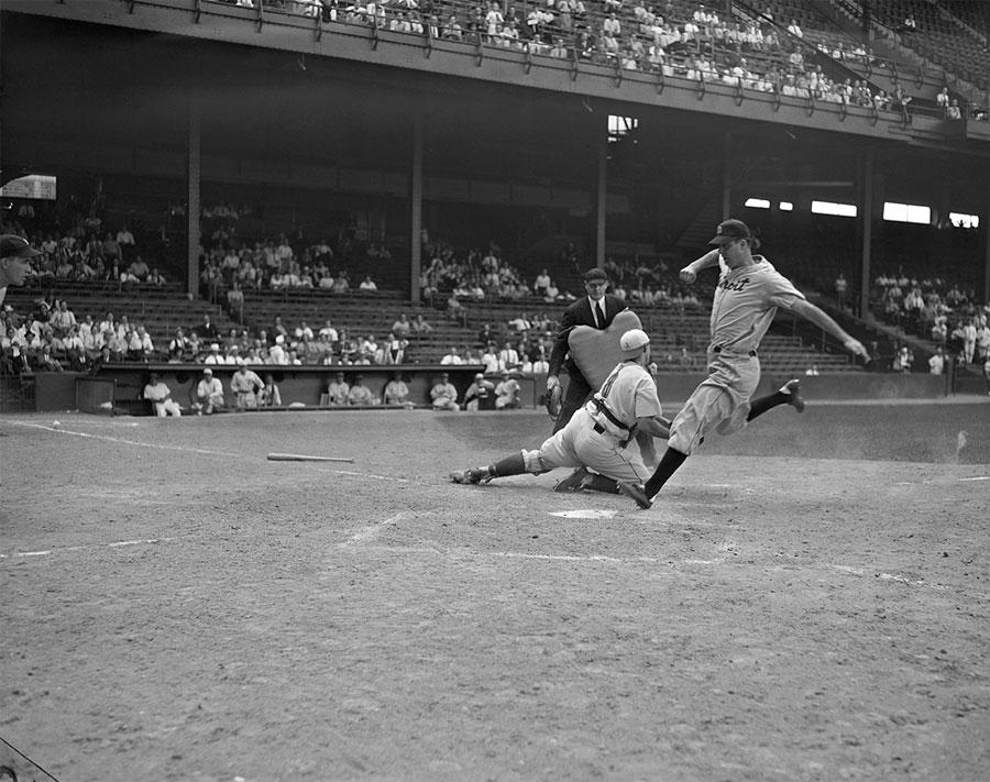 Shibe Park, Philadelphia, PA, June 4, 1940 – Detroit Tigers Hank Greenberg out at home in 8-6 loss to A’s
