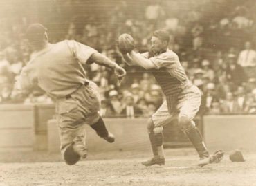 Griffith Stadium, Washington D.C., August 11, 1925 – Indians George Burns is out at home