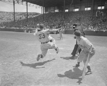 Braves Field, Boston, MA, June 17, 1948 – Cubs Gene Mauch slides home safely in game against Braves