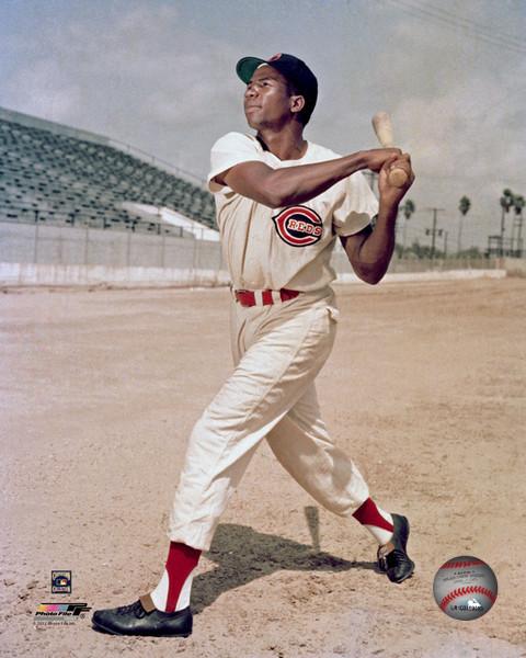 Frank Robinson (who passed away today) of the then-Cincinnati Redlegs poses  during batting practice before an MLB game against the Milwaukee Braves  circa August, 1956 at Milwaukee County Stadium. Mr. Robinson was