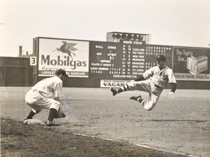 Navin Field, Detroit, MI, August 3, 1935 – Cleveland’s Roy Hughes sliding into third base spikes up in a 5-4 extra-innings win over Tigers