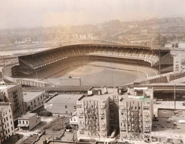 Yankee Stadium, Bronx, NY, September 27, 1932 – Hanging of the bunting is almost complete with Game One of World Series one day away