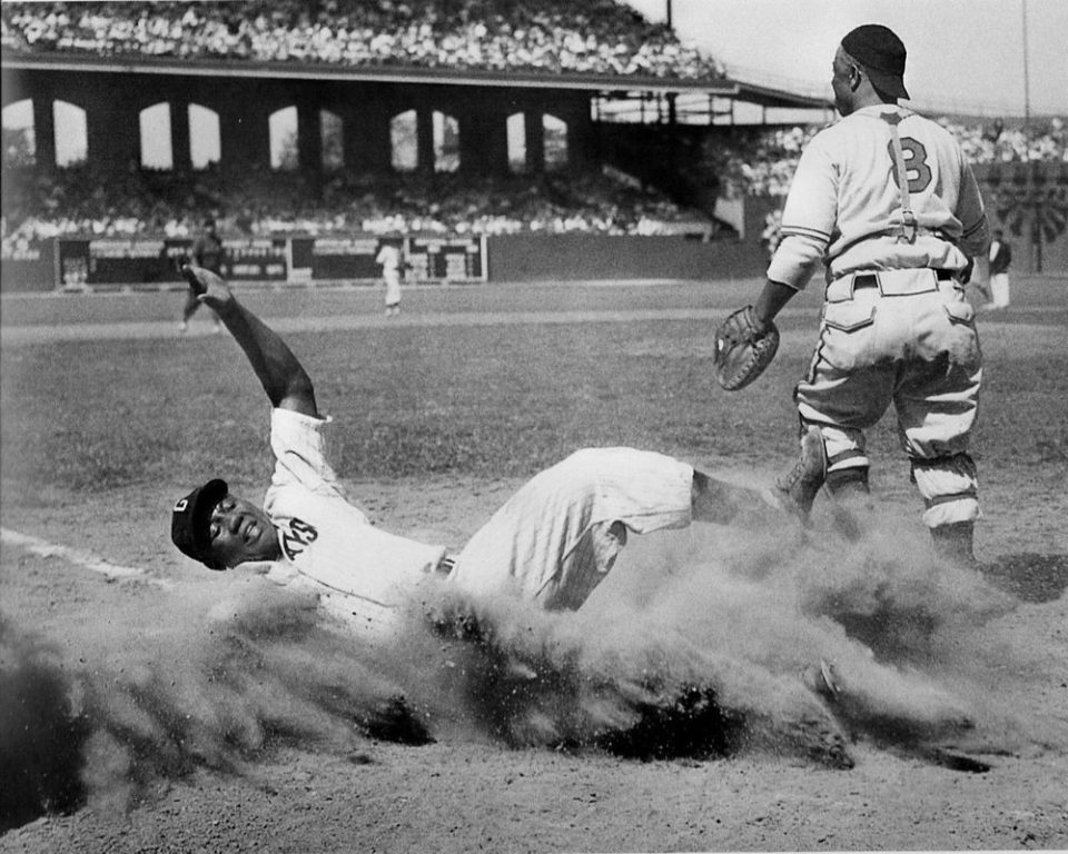 Comiskey Park, Chicago. IL, August 13, 1944 – The great Josh Gibson slides home during the 1944 Negro League All-Star game